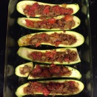 Zucchini boats with sausage and tomatoes